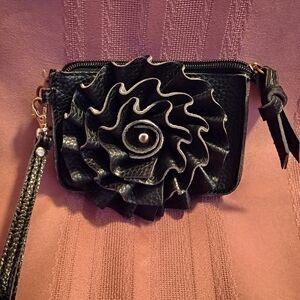Elegant Black Leather Clutch with Floral Design